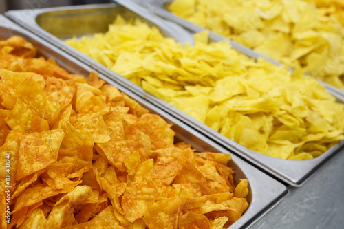 Golden chips on the counter close-up. Food