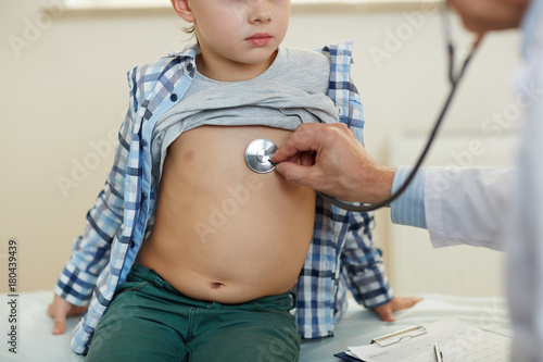 Canvas Print Check-up of little boy breath and heart-beat