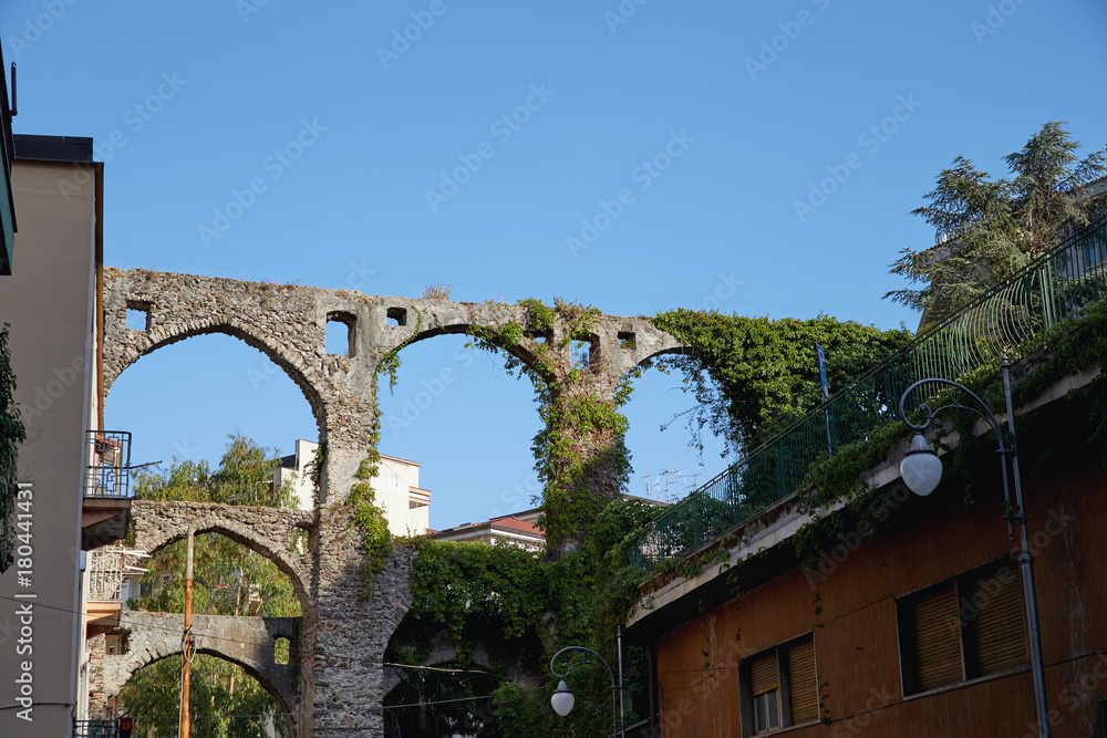 The surviving fragment old of Italian aqueducts in the city of Salerno. Partially preserved ancient water supply. The surviving fragment old of Italian aqueducts in the city of Salerno. Partially preserved ancient water supply.