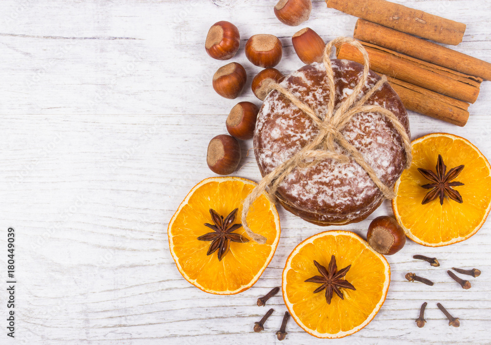 Gingerbread cookies, cinnamon and orange slices. Christmas decoration. Gingerbread cookies, cinnamon and orange slices. Christmas decoration.