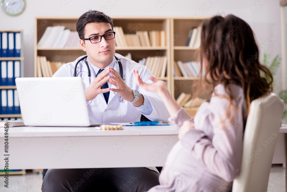 Pregnant woman visiting doctor for consultation Pregnant woman visiting doctor for consultation
