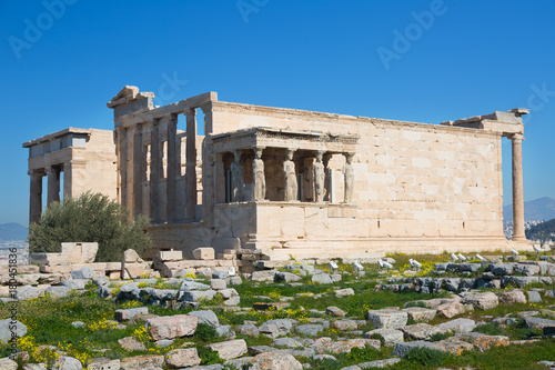 ancient temple Erechteion in sunny day,  Acropolis, Athens, Greece