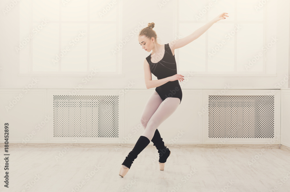 Beautiful ballerina stands in ballet assemble Beautiful ballerina stands in ballet assemble
