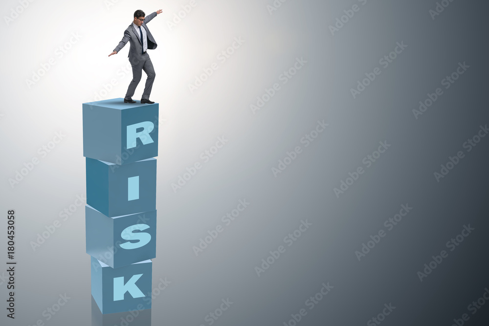 Businessman in risk and reward business concept Businessman in risk and reward business concept