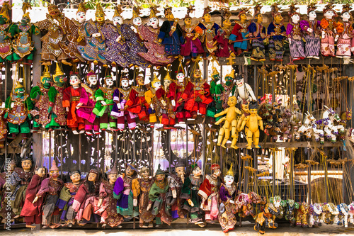 Hand Made Puppets, traditional handicrafts are sold at public street shop in Mandalay, Myanmar photo
