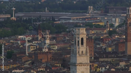 Tall towers of old cathedrals over houses of historical downtown, panorama shot photo