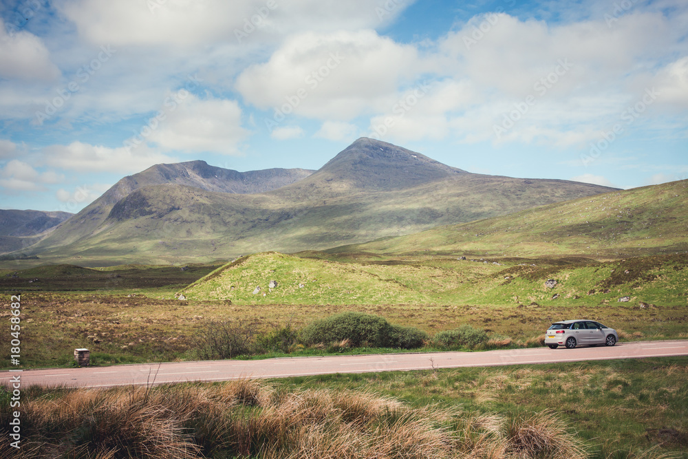 hiring a car is a popular way to get around the scottish highlands, especially when the sun makes an appearance