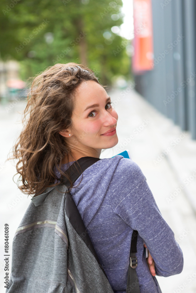 Portrait of a young student with backpack going to school and holding notebook - Back to school Portrait of a young student with backpack going to school and holding notebook - Back to school