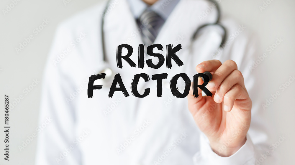 Doctor writing word Risk Factor with marker, Medical concept Doctor writing word Risk Factor with marker, Medical concept