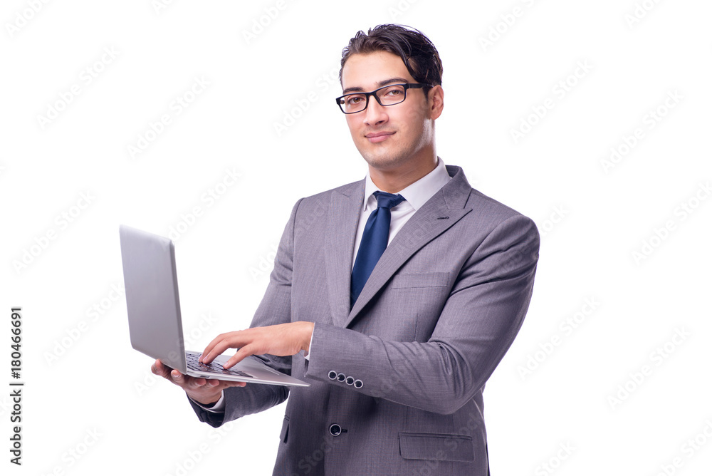 Young businessman working on laptop isolated white Young businessman working on laptop isolated white