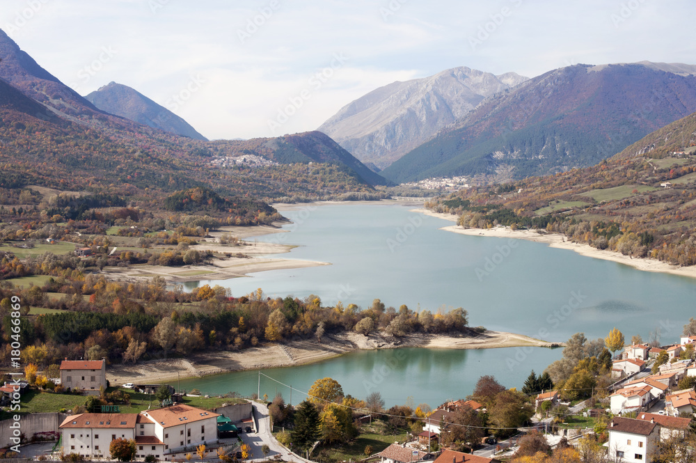 The Barrea lake with the namesake Medieval hamlet, at the foot of Mattone Mount, in the National Park of Abruzzo.