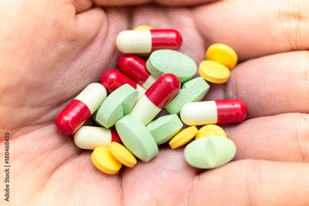 Soft focus closed up of accumulate medicine pills Soft focus closed up of accumulate medicine pills