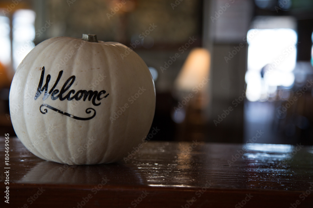 White pumpkin greeting welcome background detail closeup White pumpkin greeting welcome background detail closeup