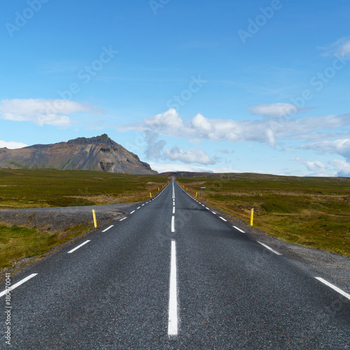 Vertical panorama view of an endless straight road