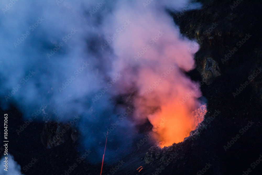 Close up of glowing fumaroles at the summit of Stromboli vulcano, Italy, at sunset.