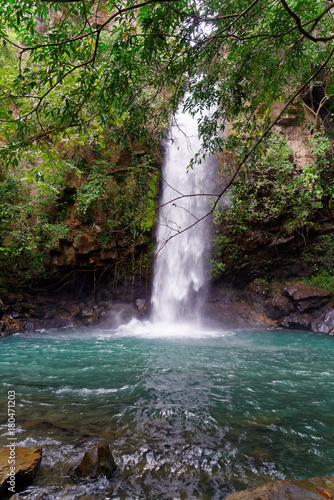 Fototapeta Naklejka Na Ścianę i Meble -  The waterfall La Cangreja is part of Rincon de La Vieja National Park, Costa Rica, which is an UNESCO world heritage site since 1999.