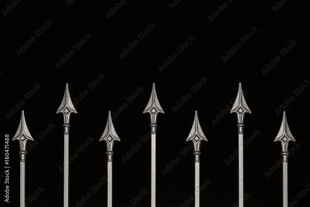 Decorative metal fence on a black background Decorative metal fence on a black background