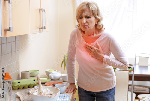 Photography Woman having heart attack at home