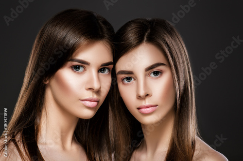 twins women with perfect skin and natural make-up 