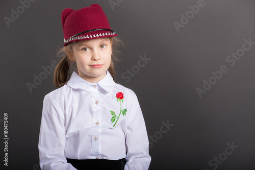 t-shirt design concept - smiling little girl in blank white t-shirt photo