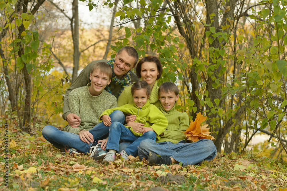 Fototapeta premium family in autumn forest
