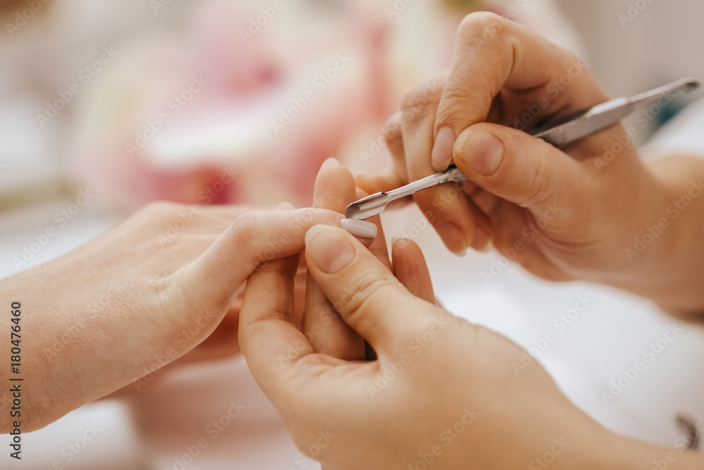 Manicurist does manicure Manicurist does manicure