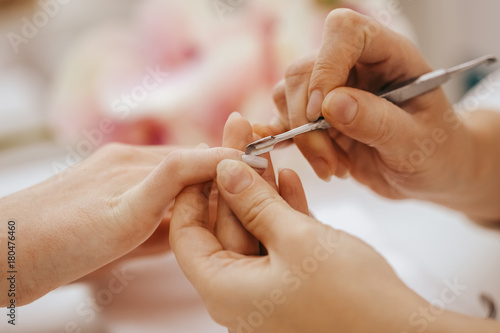 Manicurist does manicure