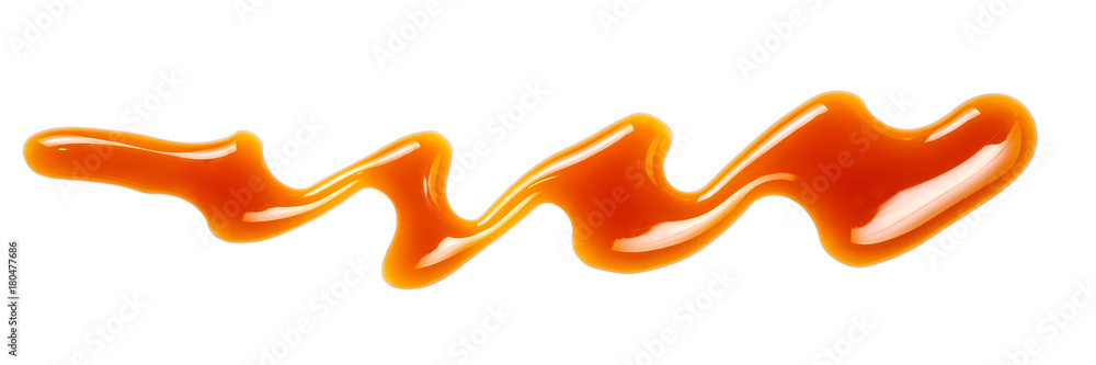 Flowing Sweet caramel sauce isolated on white background. Golden Butterscotch toffee caramel liquid . Flowing Sweet caramel sauce isolated on white background. Golden Butterscotch toffee caramel liquid .