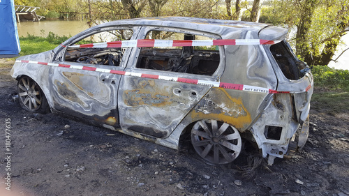 Wreck of burnt out car