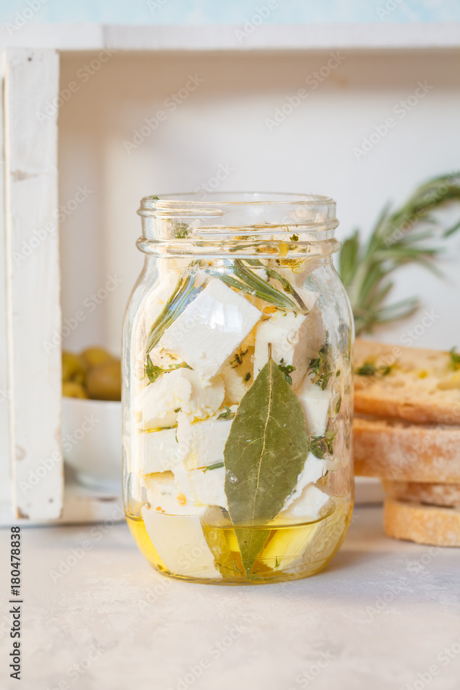 Feta cheese with olive oil and herbs