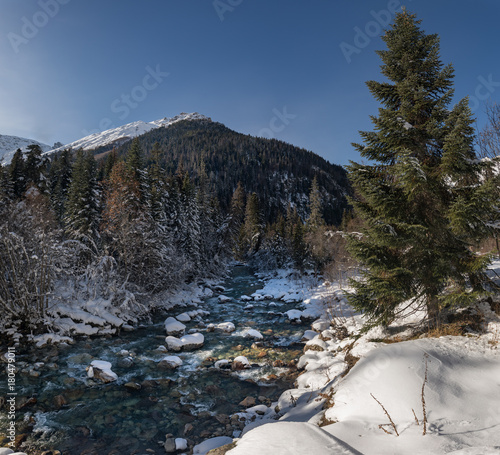 Fototapeta Naklejka Na Ścianę i Meble -  Elbrus mountain river under the snow