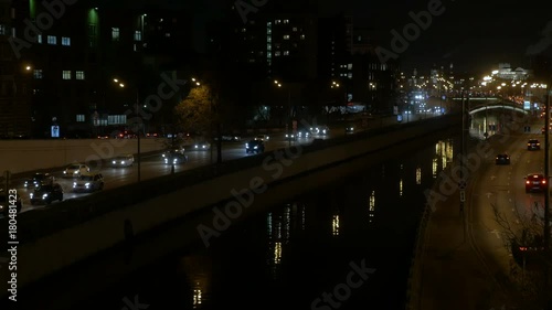 Wallpaper Mural Motion of cars, in the evening through the streets of a large city. Torontodigital.ca
