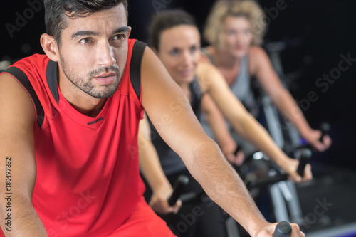 man in spinning class at a gym