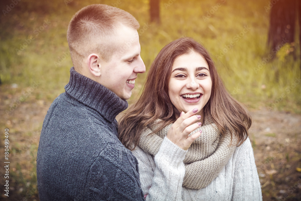 Happy young couple on nature. The concept of love. St. Valentine's Day. Happy young couple on nature. The concept of love. St. Valentine's Day.