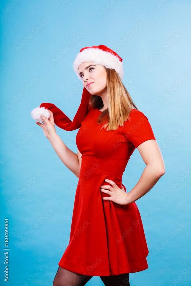 Obraz premium Happy woman wearing Santa Claus helper costume