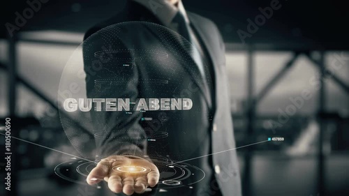 GUTEN ABEND with hologram businessman concept, in English Good Evening