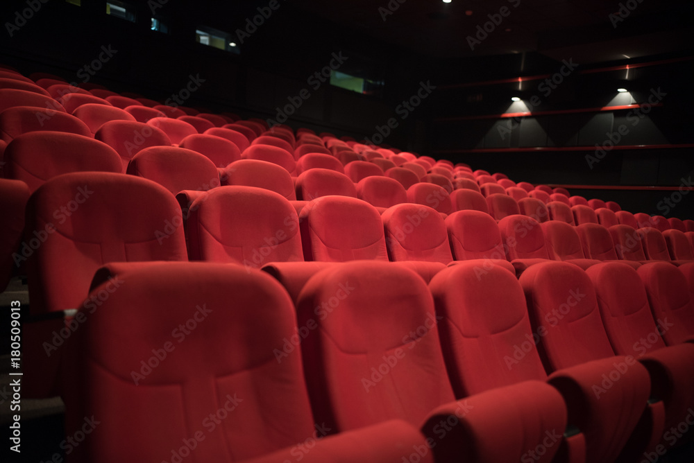 red chairs in cinema  - obrazy, fototapety, plakaty 