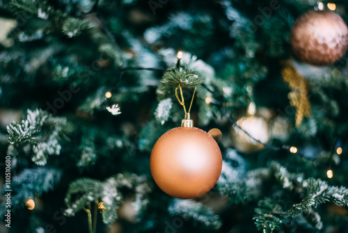 Christmas tree with toys, snowflakes and garland close-up