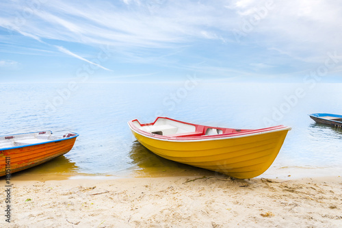 Photo Rowboats moored on the beach