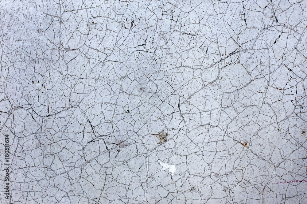 Beautiful old wall with large cracks and texture. Creative fashion basis for background for aging, vintage and trash Beautiful old wall with large cracks and texture. Creative fashion basis for background for aging, vintage and trash