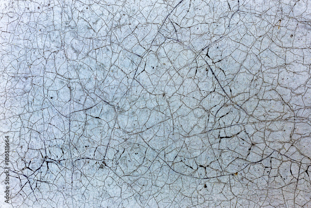 Beautiful old wall with large cracks and texture. Creative fashion basis for background for aging, vintage and trash Beautiful old wall with large cracks and texture. Creative fashion basis for background for aging, vintage and trash