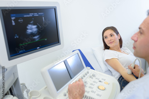 pregnant woman getting ultrasound in hospital