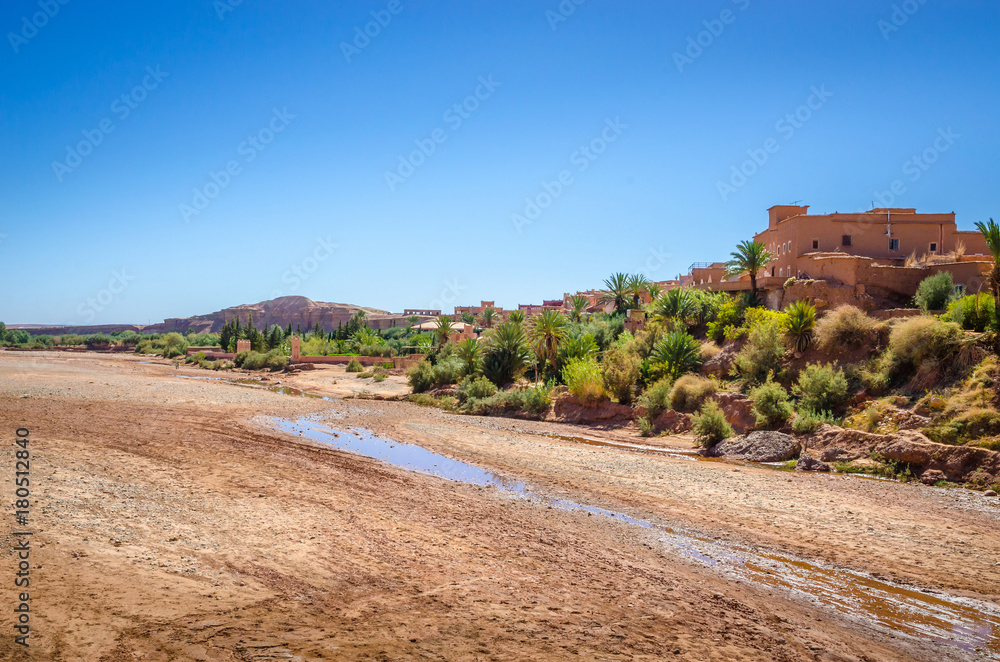 Desert village with Kasbah Ait Ben Haddou near Atlas Mountains, Morocco Desert village with Kasbah Ait Ben Haddou near Atlas Mountains, Morocco