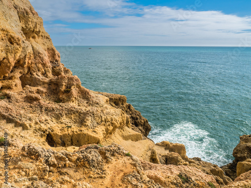 Sandcastle formation on the coast of Carvoeiro