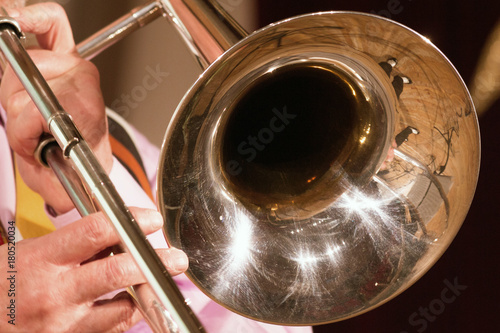 Photography The musician plays a jazz melody on a trombone