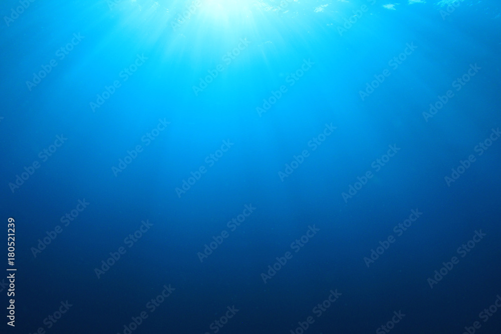 Abstract underwater blue background and sunlight Abstract underwater blue background and sunlight