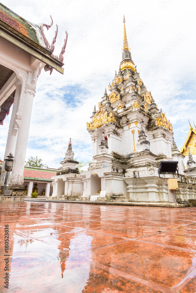 Fototapeta premium Wat Phra Boromathat Chaiya Ratchaworawihan with after raining sky in Nakhon Si Thammarat, famous temple in south of Thailand