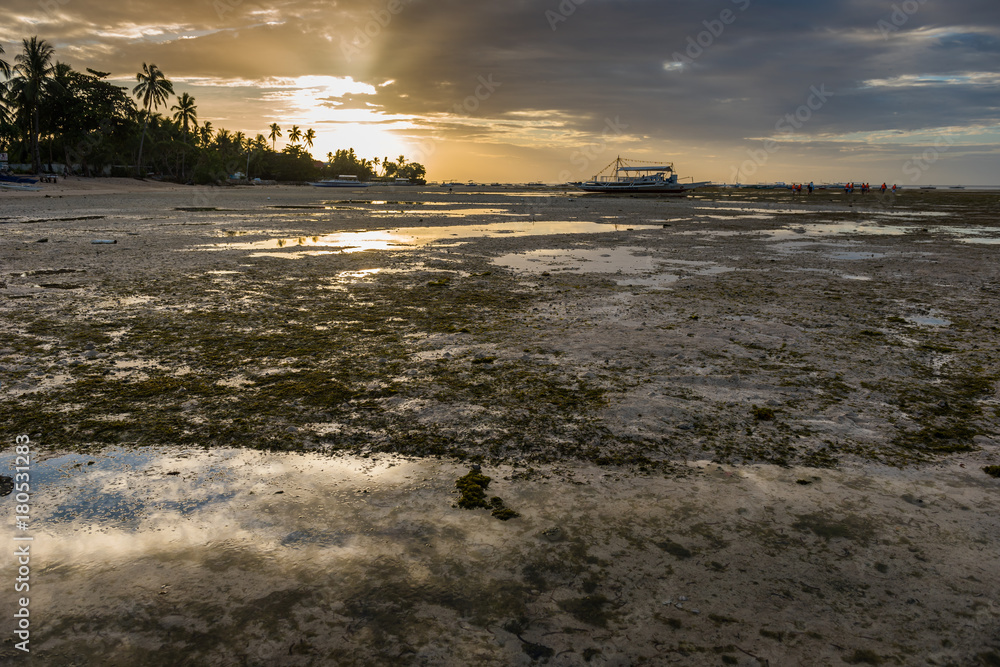 Sunrise and low tide at Panglao island of Philippines