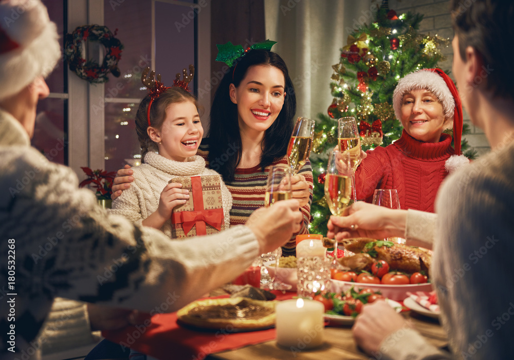 Family celebrates Christmas. Stock Photo Adobe Stock