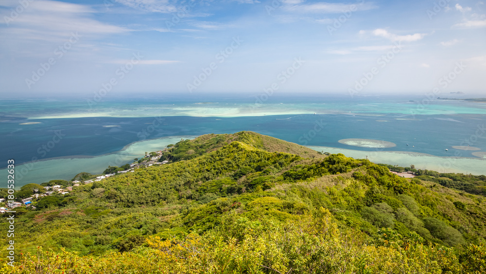 Panoramic landscape view of the Kaneohe sandbar from a pillbox hike near the tropical, blue paradise waters of Oahu, Hawaii, USA.